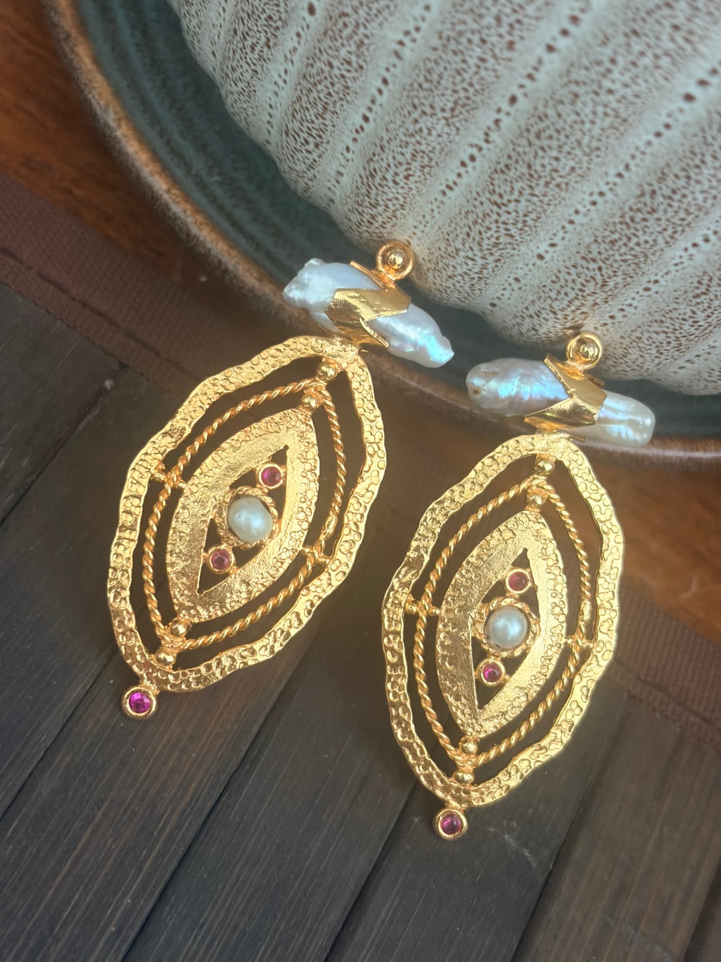 Gold filigree evil eye earrings with pearls and rubies
