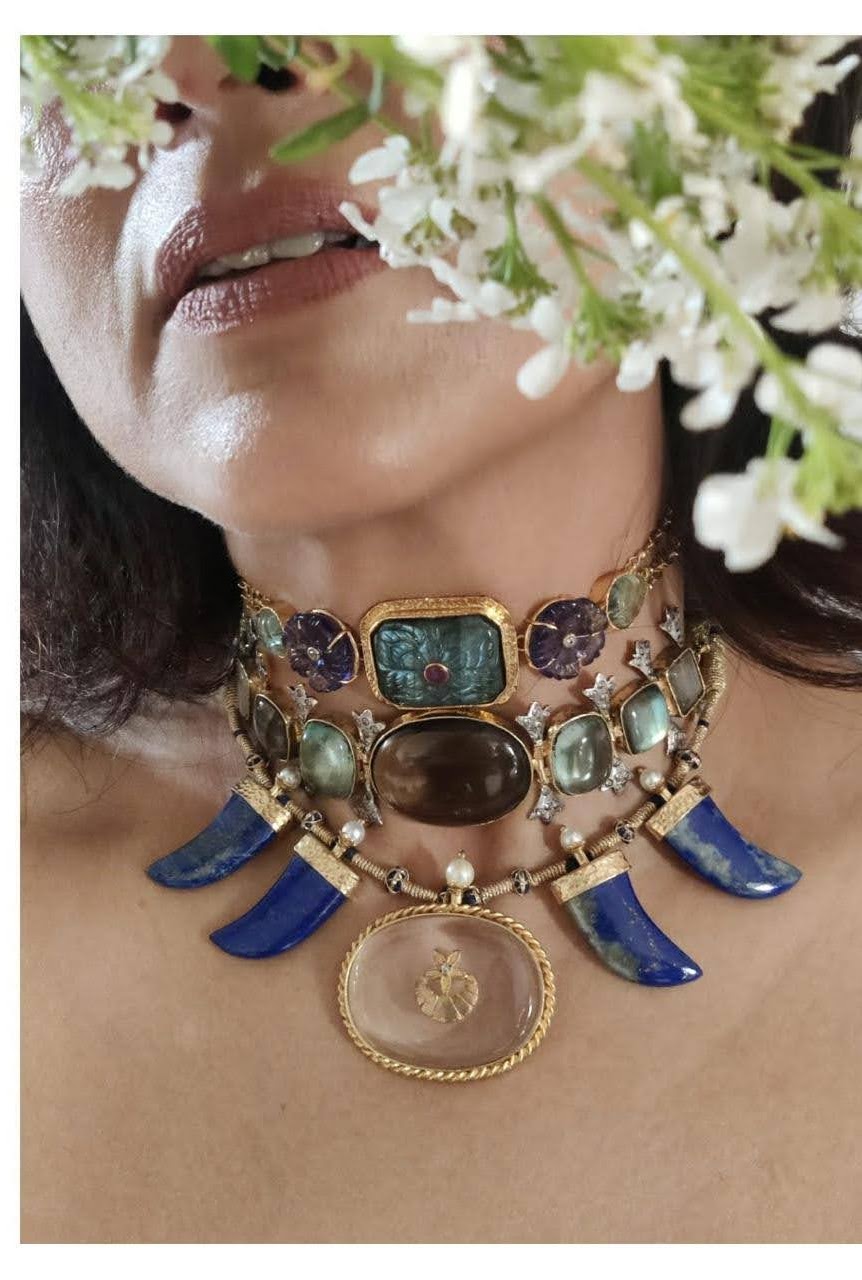 Layered choker with lapis tusks, carved stones and pearls